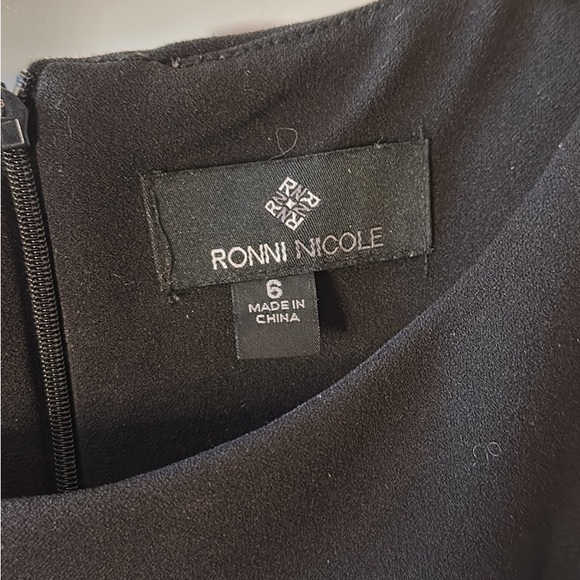 Black pencil dress in size 6. - Picture 3 of 3